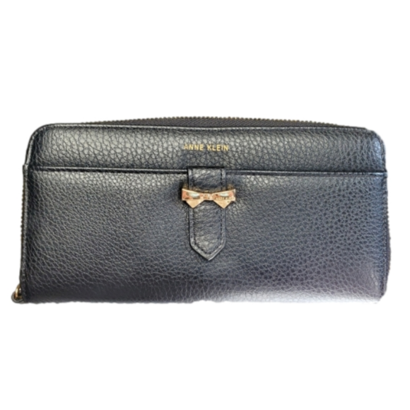 Anne Klein Handbags - NWOT Anne Klein clutch wallet black gold interior and gold bow.